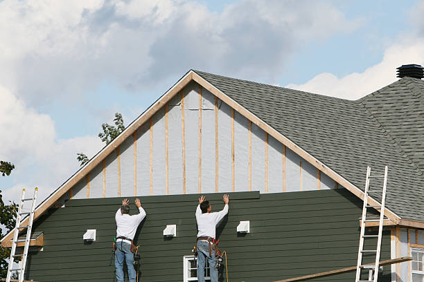 Professional Siding technician working in East Petersburg, PA